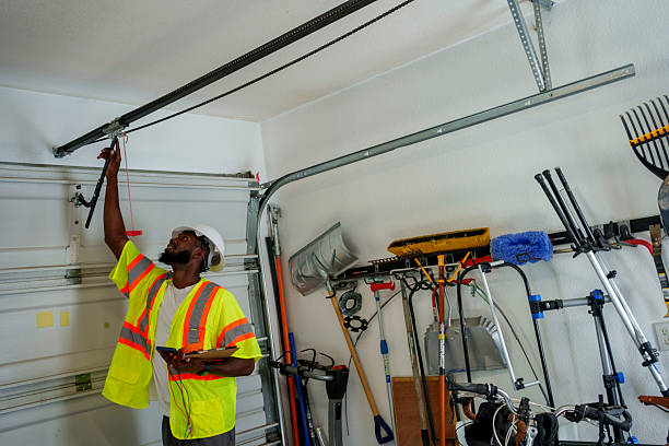 Professional Garage Door Panel Replacement technician working in Brookville, PA